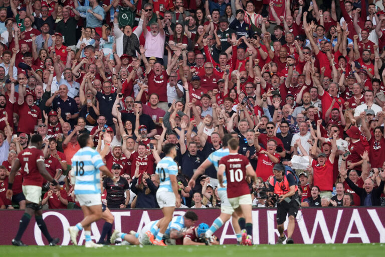 British Lions fans celebrate a try in their first match against Argentina.