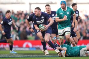 Finn Russel in possession of the ball during Scotlands loss to Ireland in this years 6 Nations.